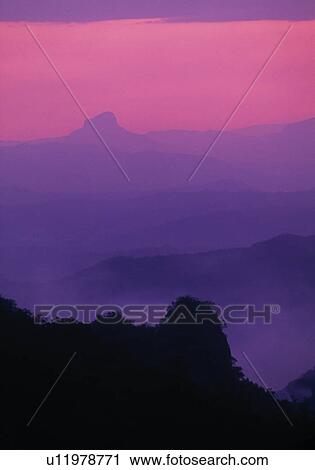 Stock Image - Purple and pink sky. Fotosearch
