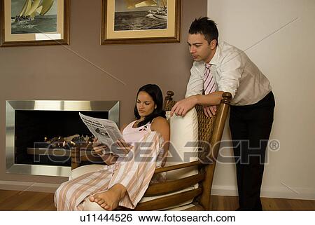 Stock Photograph - Relaxing at home. Fotosearch