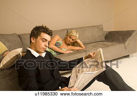 Relaxing in the living room View Large Photo Image Stock Image - Relaxing in the living room. Fotosearch