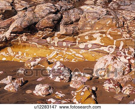 Stock Photo - Rocks and mud. Fotosearch