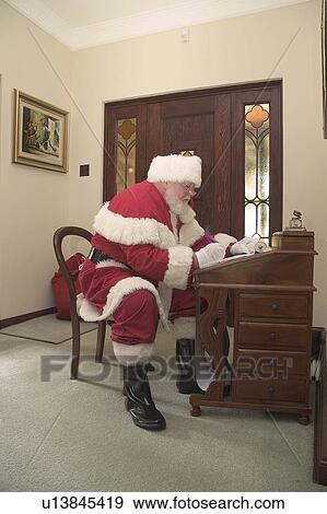Santa at home View Large Photo Image Stock Photo - Santa at home. Fotosearch