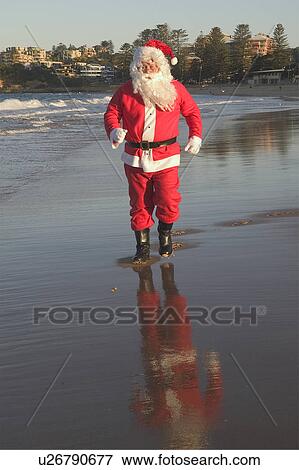 Stock Photo - Santa jogging. Fotosearch