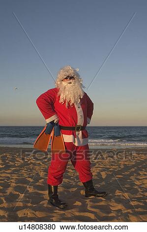 Stock Image - Santa with flippers. Fotosearch