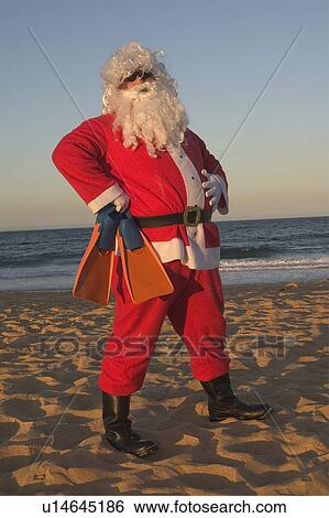 Stock Photograph - Santa with flippers. Fotosearch