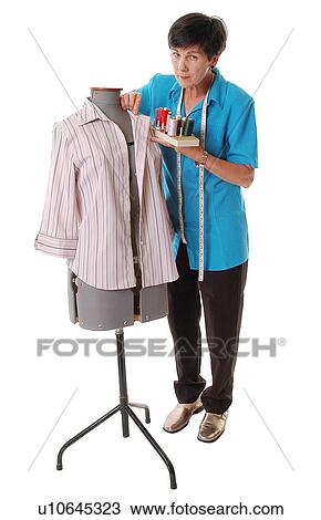 Stock Image - Seamstress. Fotosearch