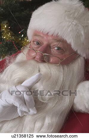 Stock Photography - Shhhh Santa. Fotosearch