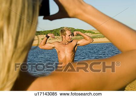 Showing off muscles View Large Photo Image Stock Photography - Showing off muscles. Fotosearch