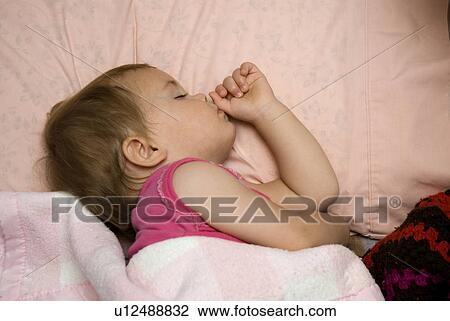 Stock Image - Sleeping baby. Fotosearch