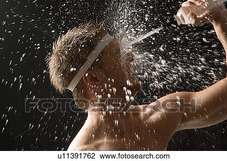 Splashing water on his face View Large Photo Image Stock Image - Splashing water on his face. Fotosearch