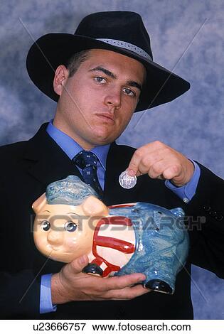 Stock Photo - Stockbroker with a piggy bank. Fotosearch