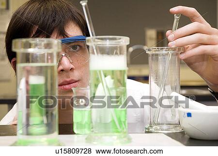 Stock Photo - Student in science lab. Fotosearch