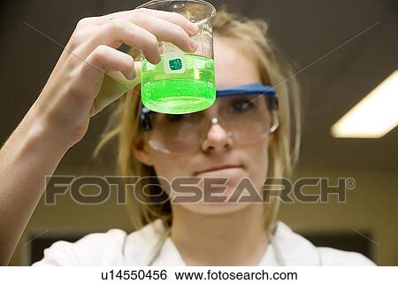 Stock Photograph - Student in science lab. Fotosearch