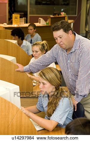 Picture - Students at computer desks. Fotosearch