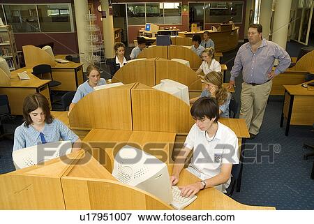 Stock Photo - Students at computers. Fotosearch