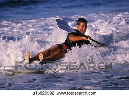 Stock Image - Surf ski rider. Fotosearch