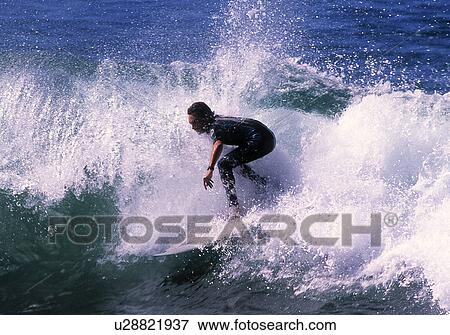 Surfboard rider View Large Photo Image Stock Photo - Surfboard rider. Fotosearch