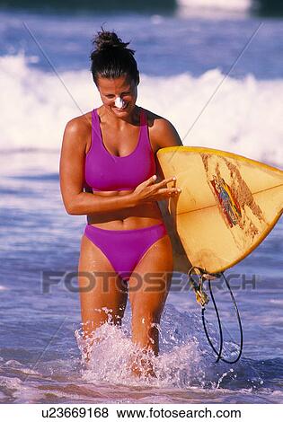 Stock Photo - Surfer woman. Fotosearch