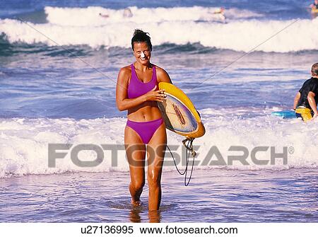 Stock Photography - Surfer woman. Fotosearch