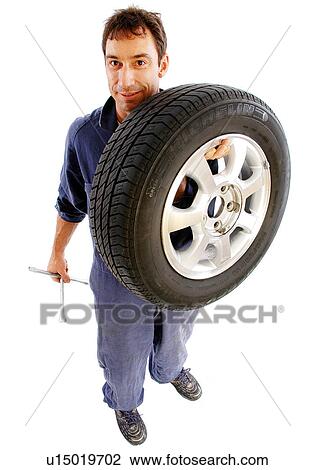 Tire mechanic View Large Photo Image Stock Image - Tire mechanic. Fotosearch