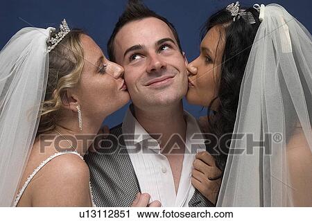 Two brides on man View Large Photo Image Stock Image - Two brides on man. Fotosearch