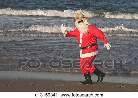 Stock Image - Wave Santa. Fotosearch
