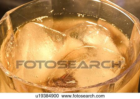 Stock Image - Whiskey on the rocks. Fotosearch
