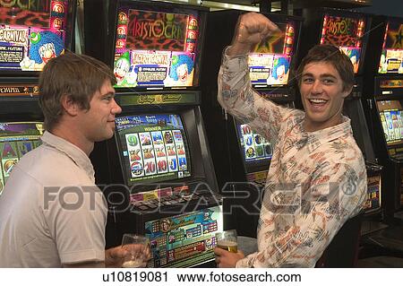 Stock Image - Winner on the slots. Fotosearch