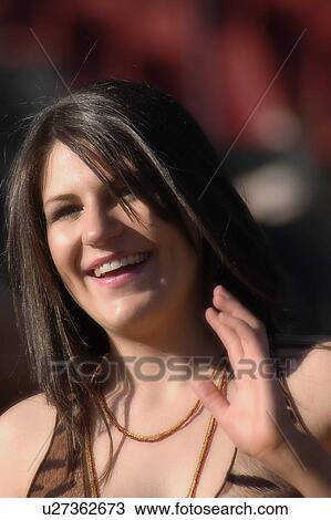 Stock Image - Woman cheering. Fotosearch