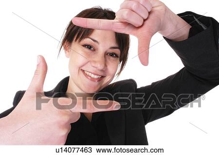 Stock Image - Woman framing her face. Fotosearch