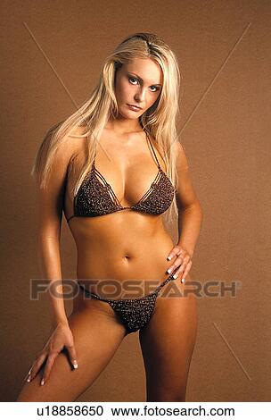 Woman in a brown bikini View Large Photo Image Stock Image - Woman in a brown bikini. Fotosearch