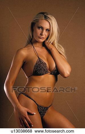 Stock Photo - Woman in a sexy brown bikini. Fotosearch