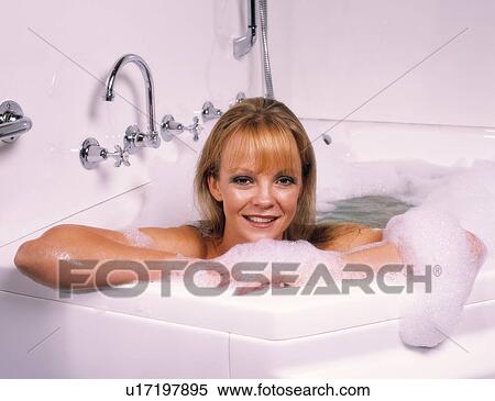 Stock Photography - Woman in the bath. Fotosearch