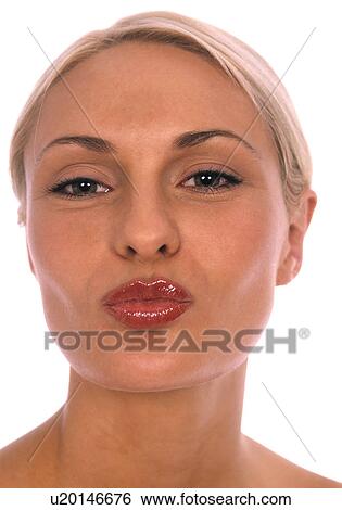 Stock Photograph - Woman kissing the camera. Fotosearch
