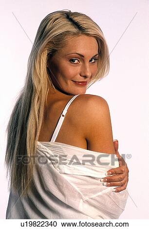 Woman looking over her shoulder View Large Photo Image Stock Image - Woman looking over her shoulder. Fotosearch