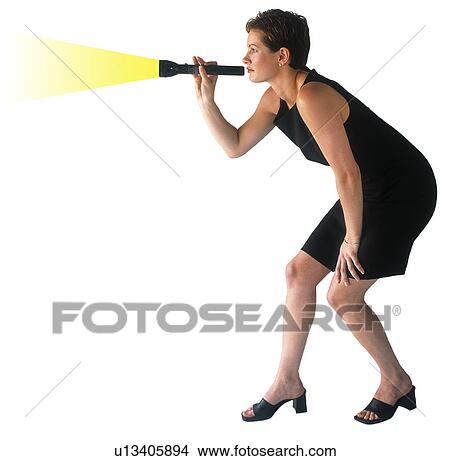 Picture - Woman with a flashlight. Fotosearch