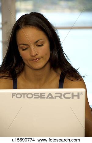 Woman working from home View Large Photo Image Picture - Woman working from home. Fotosearch