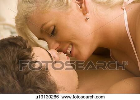 Stock Photograph - Young lovers. Fotosearch