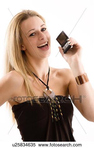 Stock Photography - Young woman on mobile phone. Fotosearch