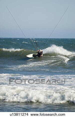 A male kite surfing View Large Photo Image Picture - A male kite surfing. Fotosearch