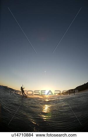 A male kite surfing View Large Photo Image Picture - A male kite surfing. Fotosearch
