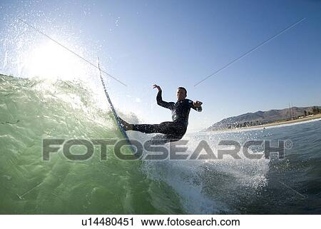 A male surfer View Large Photo Image Stock Image - A male surfer. Fotosearch
