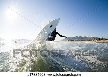 A male surfer View Large Photo Image Stock Image - A male surfer. Fotosearch