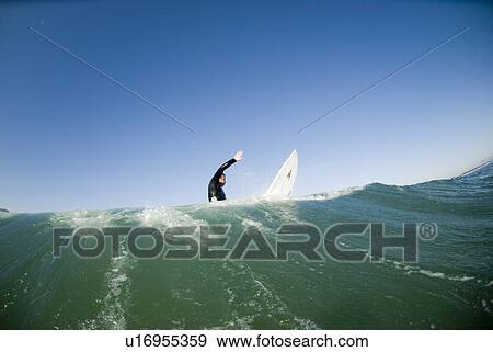 A male surfer View Large Photo Image Stock Photo - A male surfer. Fotosearch