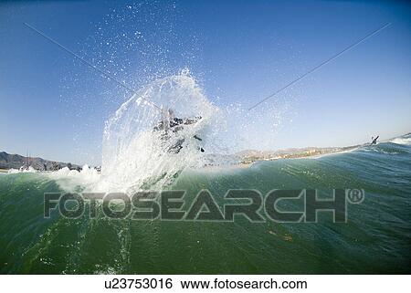 A male surfer View Large Photo Image Stock Photograph - A male surfer. Fotosearch