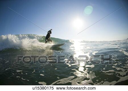 A male surfer View Large Photo Image Stock Photography - A male surfer. Fotosearch