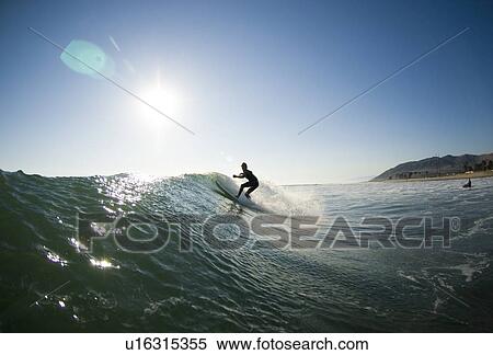 A male surfer View Large Photo Image Stock Photography - A male surfer. Fotosearch