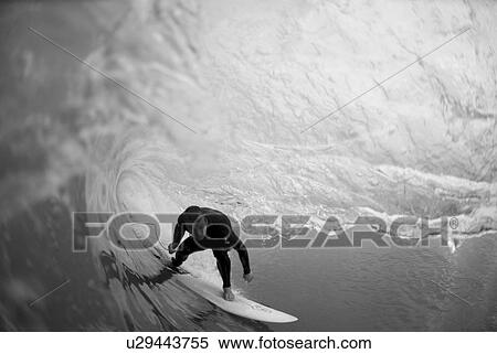 A male surfing View Large Photo Image Stock Photography - A male surfing. Fotosearch