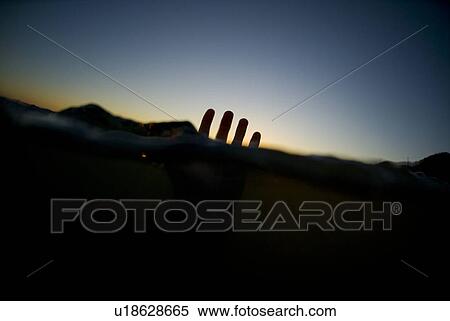 A male's hand in the water View Large Photo Image Stock Photography - A male's hand in the water. Fotosearch