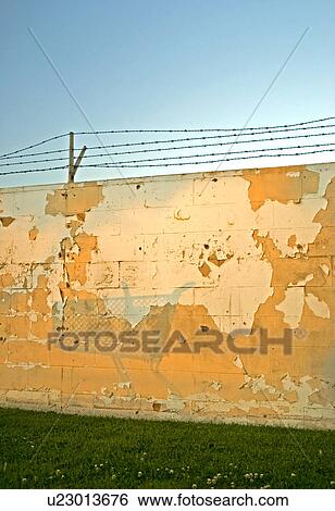 Stock Photograph - A shadow of a shopping cart on the side of a wall. Fotosearch