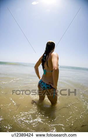 A young girl in the water View Large Photo Image Picture - A young girl in the water. Fotosearch